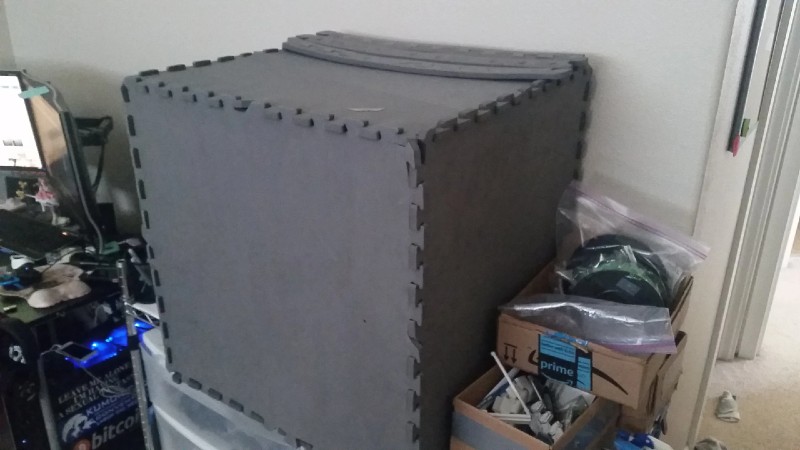 An image of Exercise and Kids Mats being used as a DIY enclosure