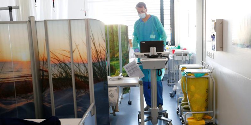 Swiss soilders moving equipment through a hospital