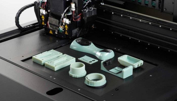 the material jetting 3d printing process in mid print