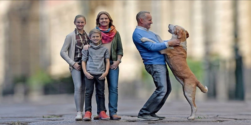 A 3D printed family and a 3D printed man with his dog 